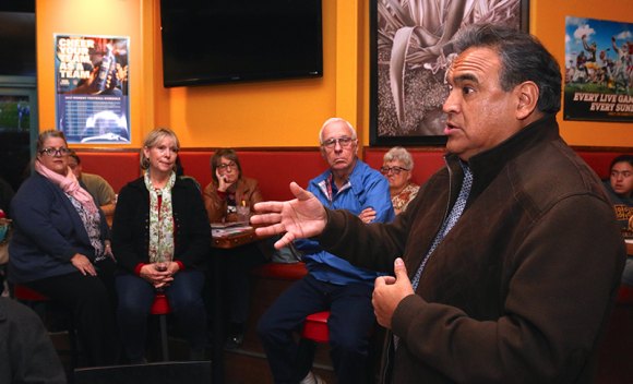 Congressional Candidate Emilio Huerta speaks to members of the Jimmy Carter Democratic Club in Hanford.